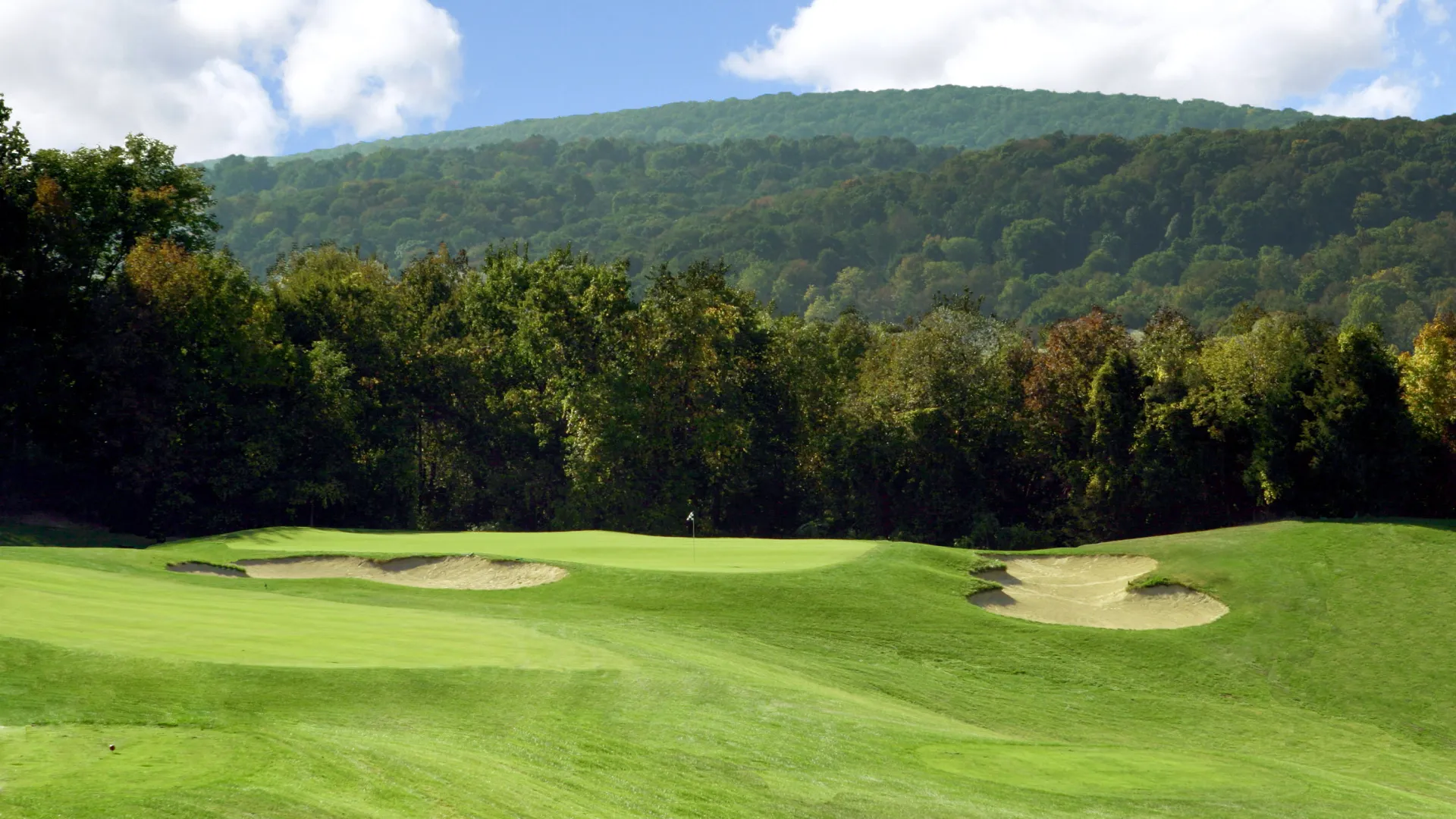 A view of the mountains from the fairway at Minerals Golf Club at Crystal Springs Resort