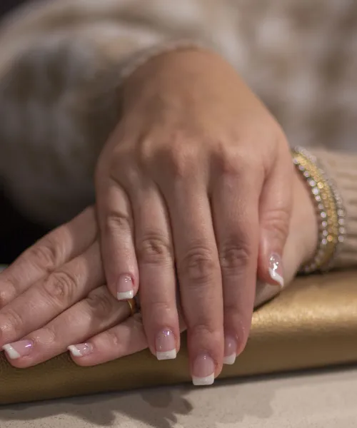 French manicured hands.