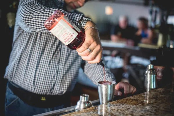 Bartender making a cocktail at Kites Restaurant